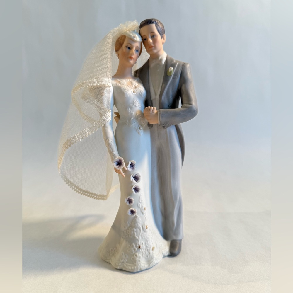 Elegant Wedding Cake Topper with Veil and Floral Accents